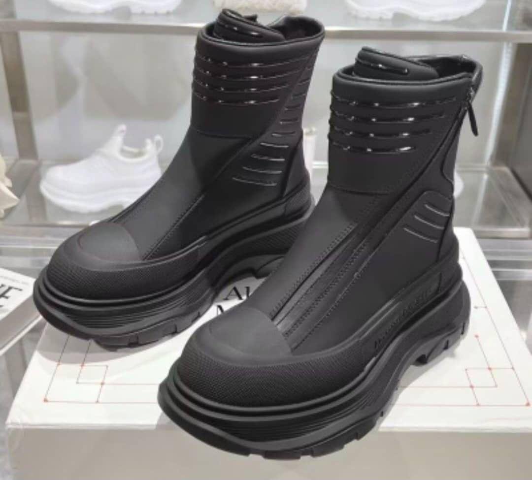 Buy trendy type in black ankle boots with platform soles and zipper closure, perfect for Ghana shoppers seeking stylish footwear and comfort.